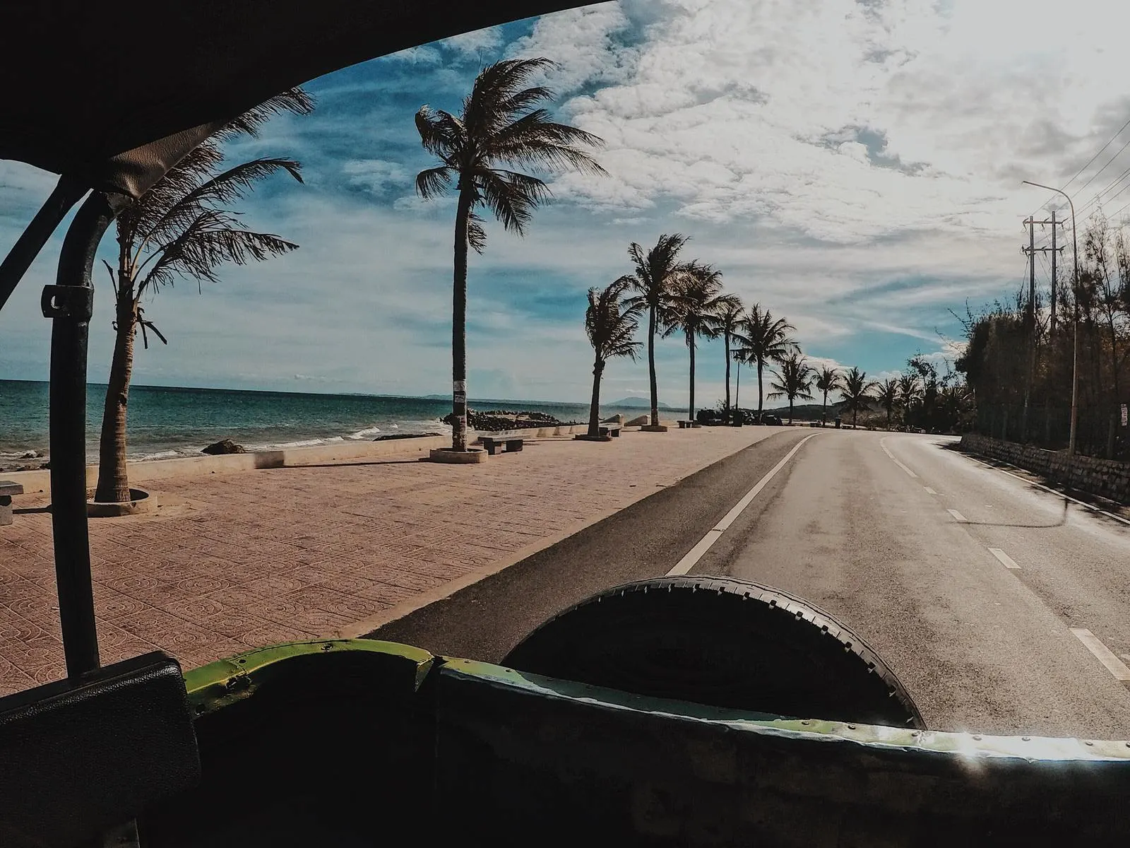 Driving along the beach on a jeep!
