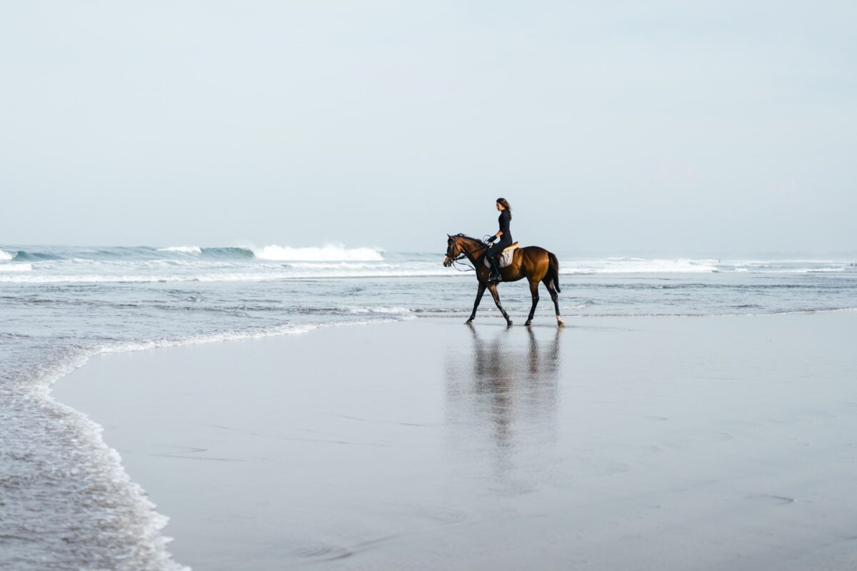 ride horses on the beach